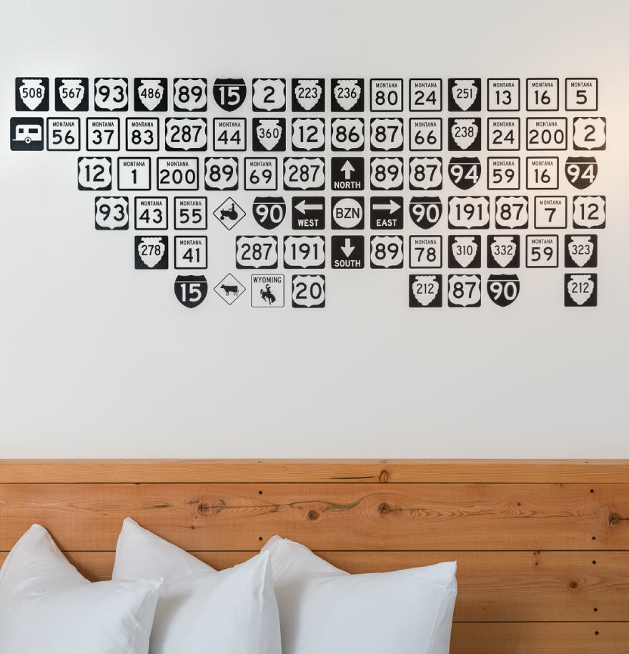 Close-up of some of "The Interstate Signs" artwork done by Jeremy Sandlin found in our downtown Bozeman hotel rooms