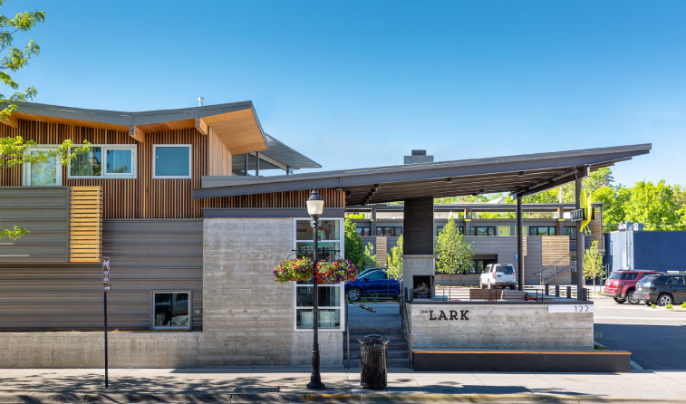 Exterior shot displaying the side view of our downtown Bozeman hotel. Boutique style architecture, and clear skies